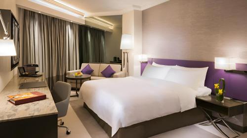 เตียงในห้องที่ Gateway Hotel, Marco Polo