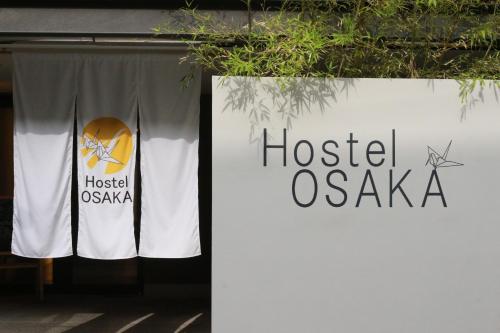 Palkinto, sertifikaatti, kyltti tai muu asiakirja, joka on esillä majoituspaikassa Hostel OSAKA