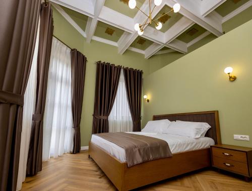 Кровать или кровати в номере Boutique Hotel Vila 101