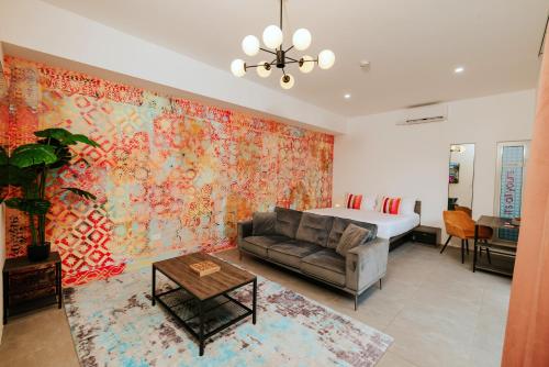 אזור ישיבה ב-Privada Stays - Lofts with Private Pool and Oasis, near Eagle Beach