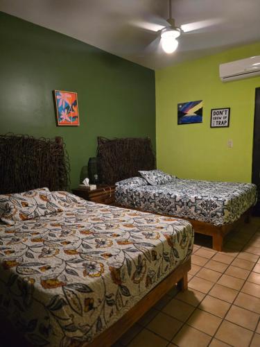 A bed or beds in a room at casita de lola