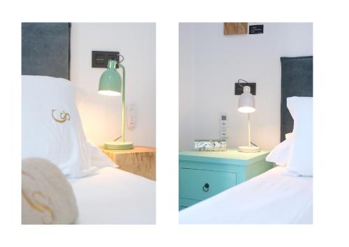 A bed or beds in a room at Casa Serena 10 Boutique- Adults Only-Breakfast Included