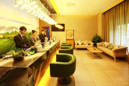 พื้นที่นั่งเล่นของ Qiuguo Hotel Beijing BIEC & Airport