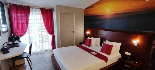 Tulip Inn Sainte Clotilde, La Réunion में एक कमरे में एक या कई बेड