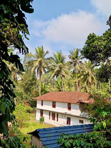 Un jardín fuera de O2 estate Stay Coorg