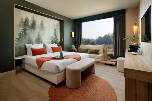 Cama ou camas em um quarto em Van Der Valk Luxembourg Arlon