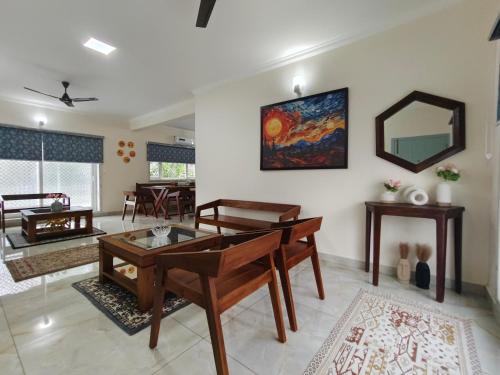 Uma área de estar em Onyx3, Best 3BHK Luxury Home Stay Thrissur - 7Elysee Homes