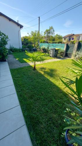 Vonkajšia záhrada v ubytovaní K&N - Maison à partager avec d'autres voyageurs - Chambre privée - Jardin - Balcon