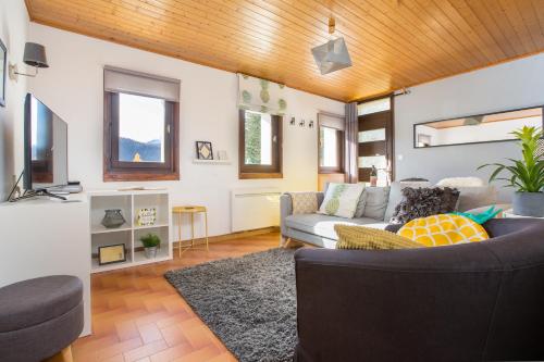 Et tv og/eller underholdning på Mountainside Apartment with views over Morzine