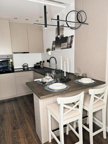 Una cocina o cocineta en Premium Line Apartman