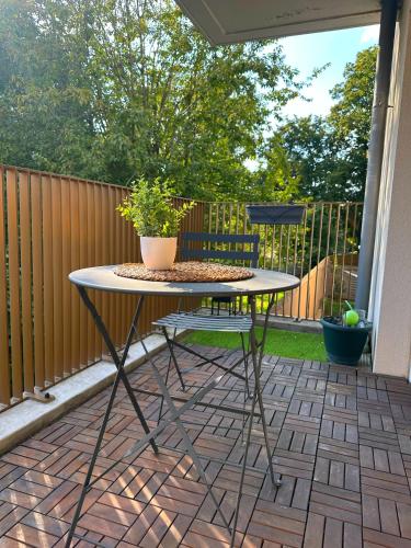 Un balcón o terraza en L oasis - 15mn de Paris -10 mn du Stade de France