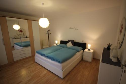 Кровать или кровати в номере Appartement Romantikstadt Steyr