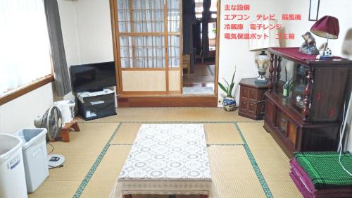 TV tai viihdekeskus majoituspaikassa Minsyuku Okinawa Kubotaso - Vacation STAY 87569v