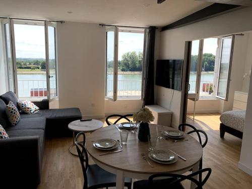 พื้นที่นั่งเล่นของ Appartement neuf, vue sur saône