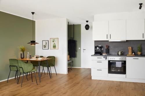 Una cocina o cocineta en MATT - Apartments ' Design-Apartment mit Balkon