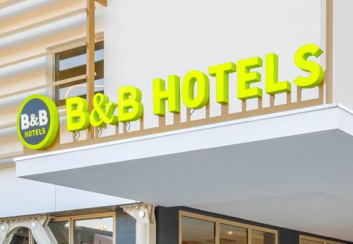 Et logo, certifikat, skilt eller en pris der bliver vist frem på B&B HOTEL Thionville Yutz Route du Luxembourg