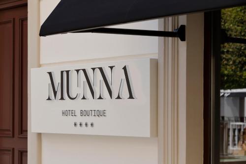 Sertifikat, nagrada, logo ili drugi dokument prikazan u objektu Munna Hotel Boutique