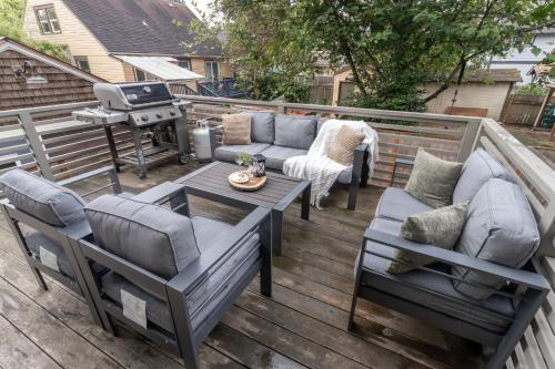 A seating area at Comfy Family Home, Walkable Neighborhood + Patio!