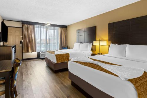 Best Western Toni Inn में एक कमरे में एक या कई बेड