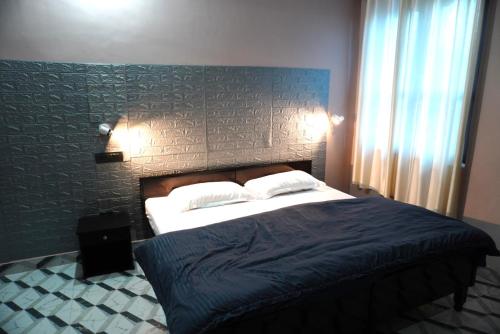 Cama ou camas em um quarto em G2 cafe and homestay