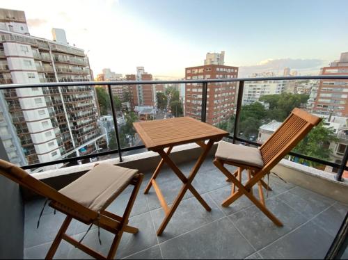 Un balcón o terraza en EUGE Apart