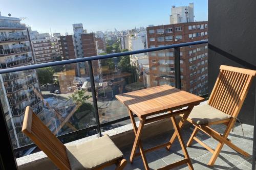 Un balcón o terraza en EUGE Apart