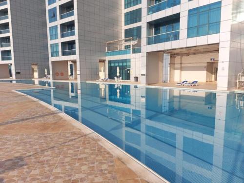 The swimming pool at or close to Sunset Sea view Furnish Apartment