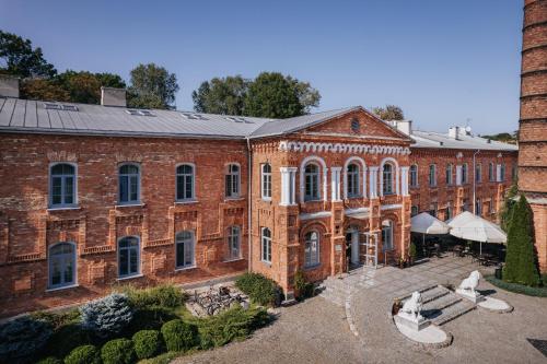 an aerial view of a large brick building at Royal Hotel Modlin in Nowy Dwór Mazowiecki