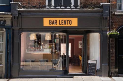 a store front of a bar leventore store at Lento Apartment in Winchester