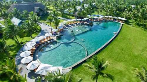 Bazén v ubytovaní Bliss Hoi An Beach Resort & Wellness alebo v jeho blízkosti