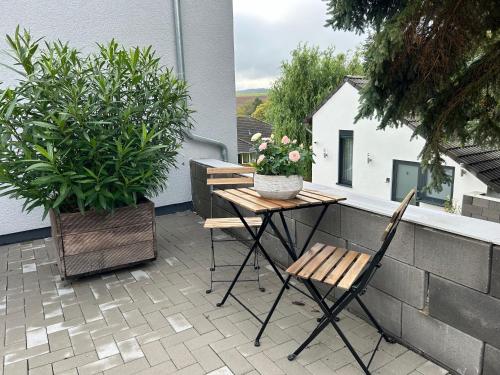 Un balcón o terraza en Koblenzer Naturhaus & Apartments