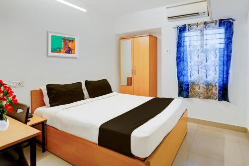 Lova arba lovos apgyvendinimo įstaigoje Super Hotel O Valasaravakkam Near Chandra Metro Mall