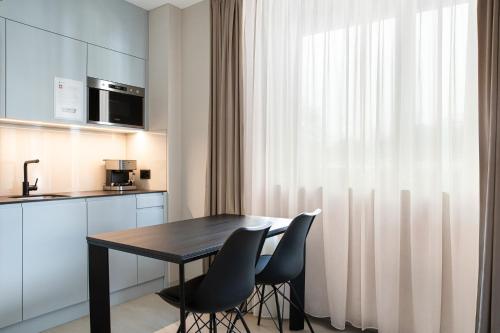 Una cocina o kitchenette en VISIONAPARTMENTS Lugano