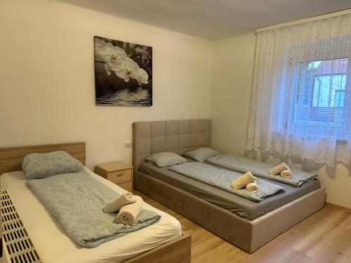 Krevet ili kreveti u jedinici u okviru objekta Cheap Outlet Center Apartment with Pool