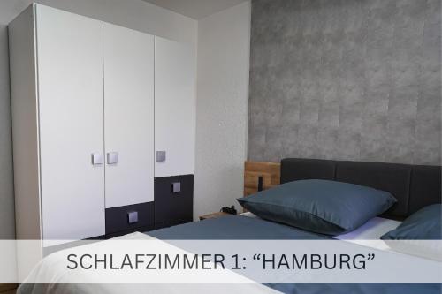 Cama ou camas em um quarto em Moderne 3-Zimmer-Wohnung im Herzen von Darmstadt - Zentrale Lage, Komfort & WLAN