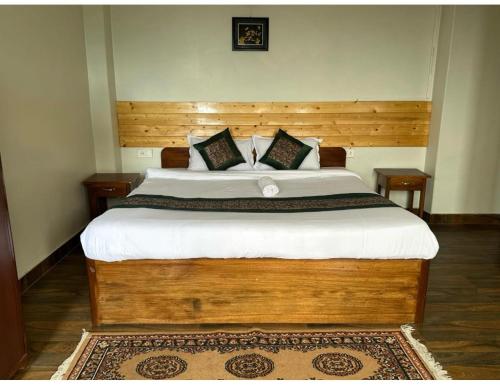 Cama ou camas em um quarto em The Hill Castle, Gangtok