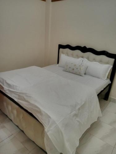 Cama ou camas em um quarto em Rover apartments