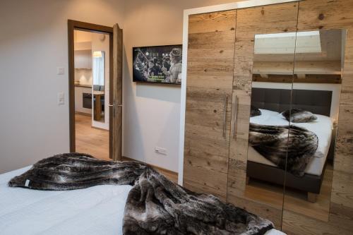 Cama ou camas em um quarto em Panorama Ski Lodge