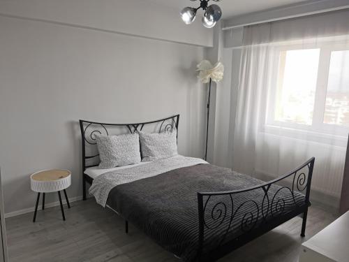 Cama ou camas em um quarto em Apartament Carla