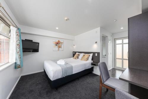 Tempat tidur dalam kamar di 315 Motel Riccarton