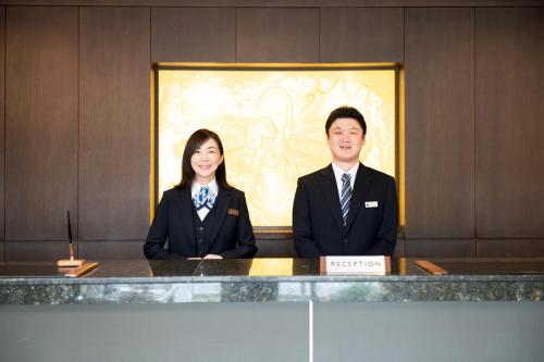 Personāls naktsmītnē Hotel Aston Plaza Himeji