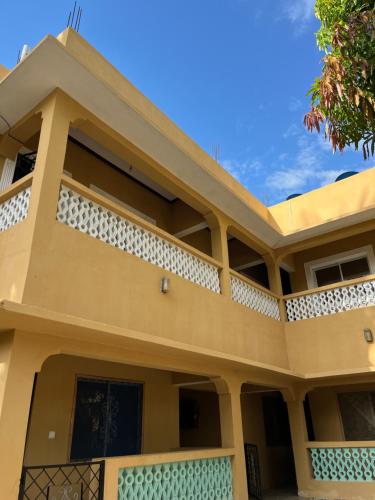 a view of a house with a balcony at Zuri home in Watamu