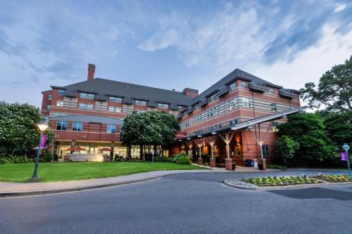 a large brick building with a street in front of it at Kellogg Conference Hotel Capitol Hill at Gallaudet University in Washington