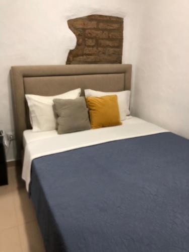 A bed or beds in a room at Recanto da Aldeia