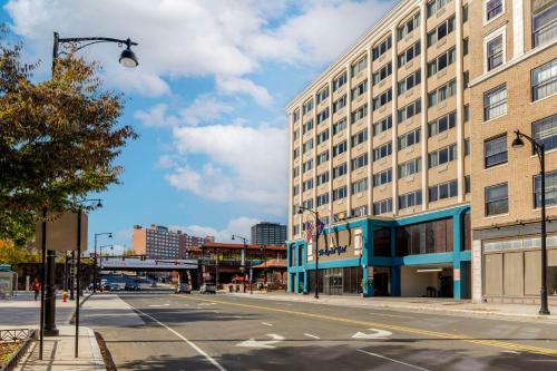 an empty street in a city with a building at The Capitol Hotel, Ascend Hotel Collection in Hartford