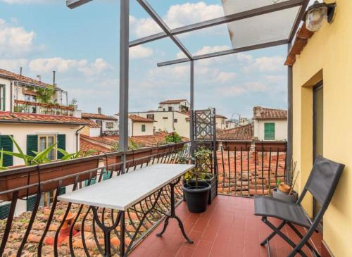 En balkon eller terrasse på Numa Florence Palazzo Haggis