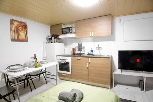 Una cocina o cocineta en Stilvolles 1,5-Zimmer-Apartment in Neckarsulm mit eigenem Parkplatz