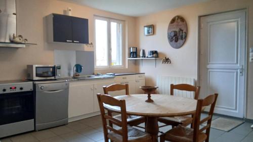 Una cocina o kitchenette en Maison individuelle