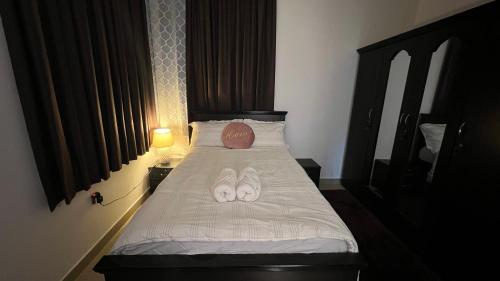 Giường trong phòng chung tại XD Sudio Apartment