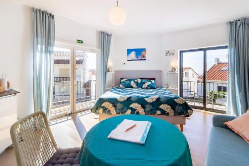 Voodi või voodid majutusasutuse Nazare Oasis Suites toas